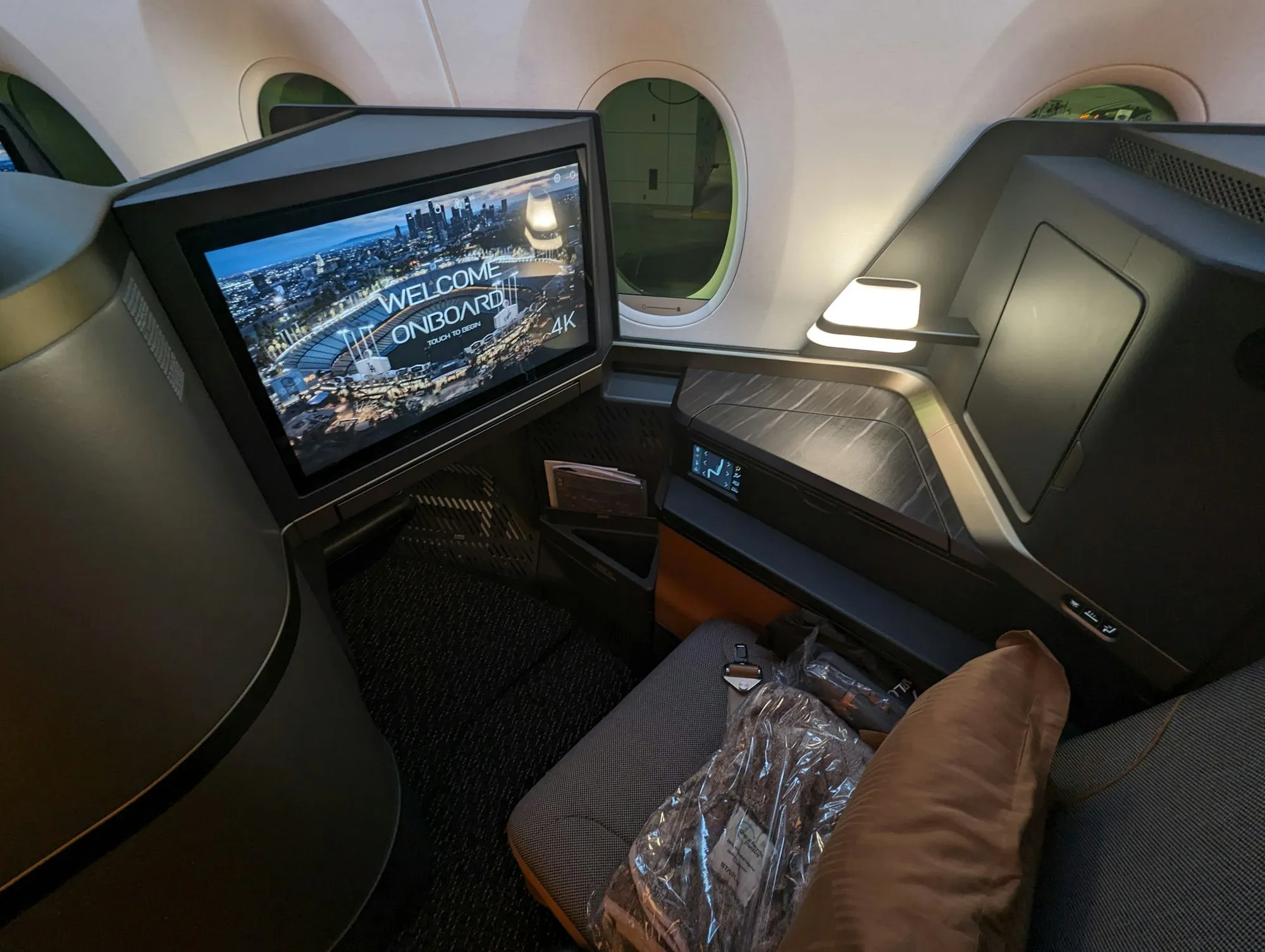 A business-class cabin aboard a widebody aircraft