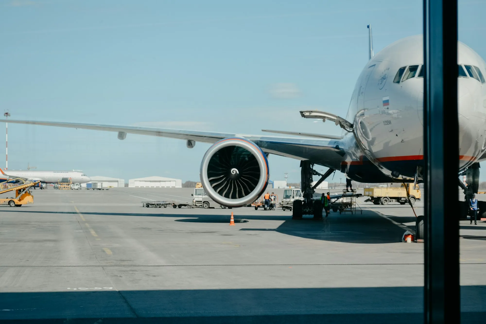 A commercial airliner on an airport runway
