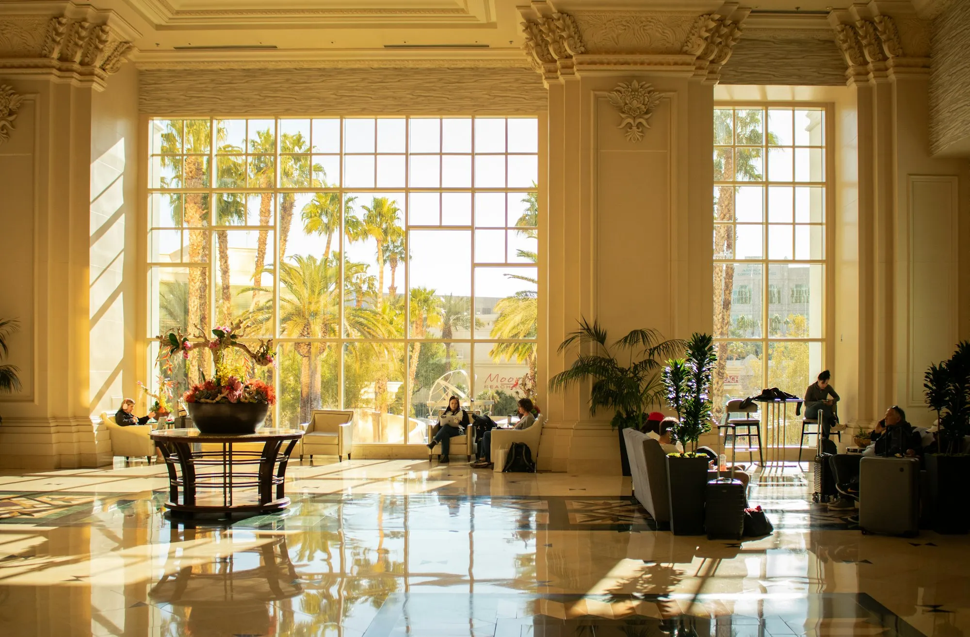 An elegant interior looking out toward a bright exterior view